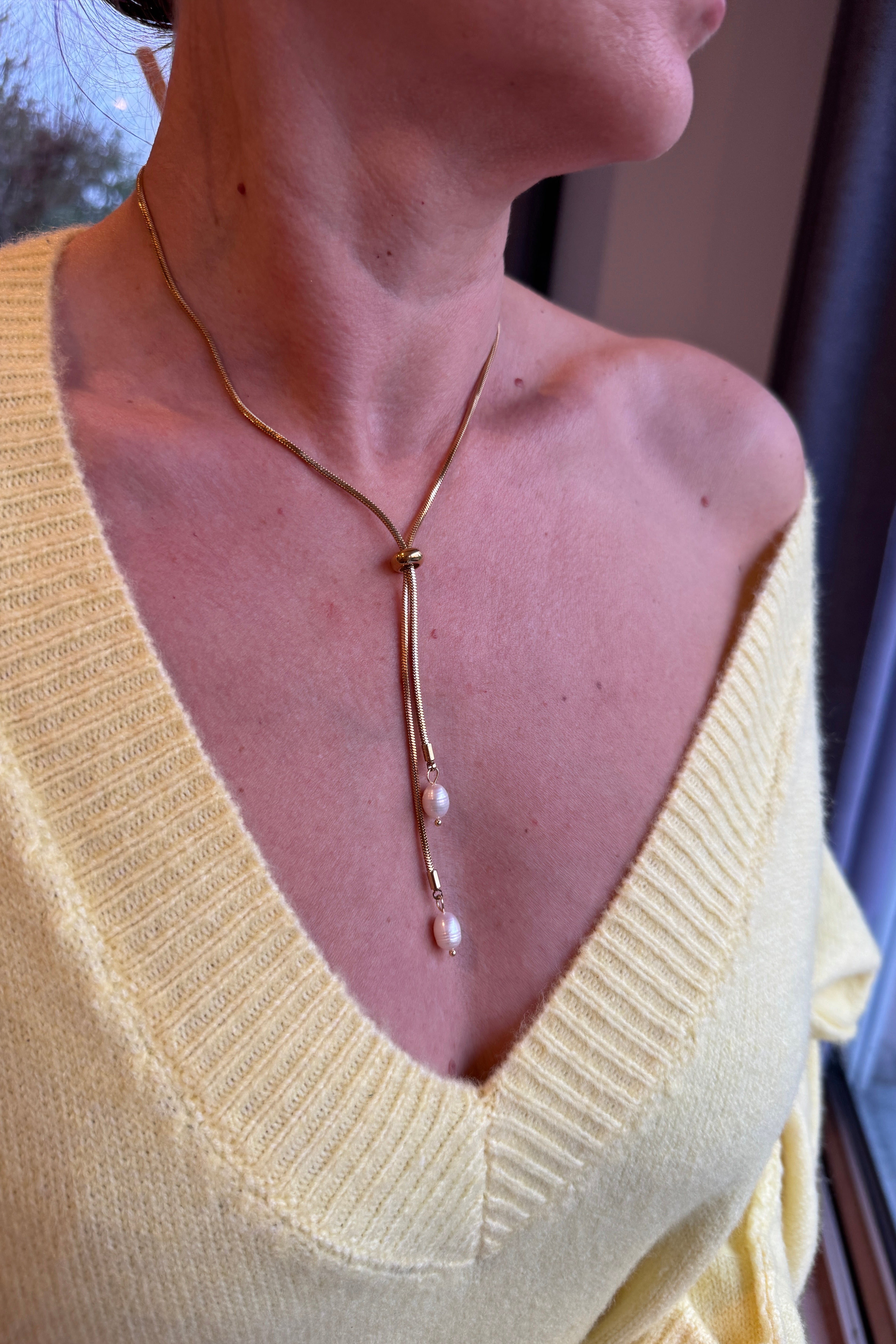 Collier acier inoxydable deux perles or 